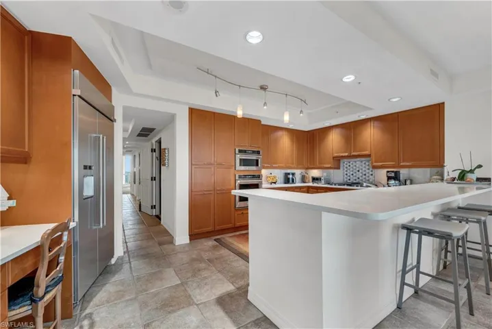 7575  Pelican Bay  BLVD, Naples, FL 34108