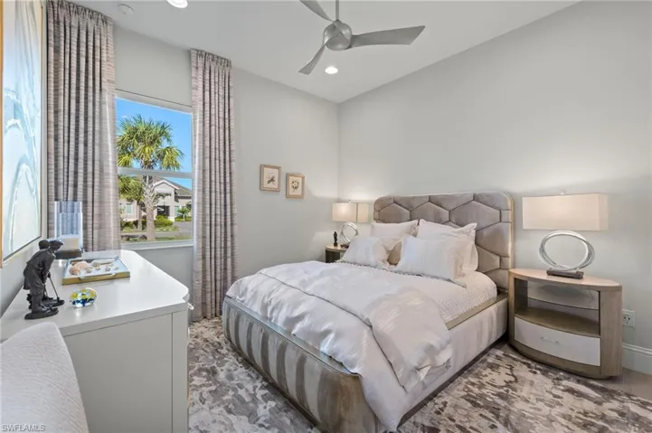 Bedroom featuring ceiling fan