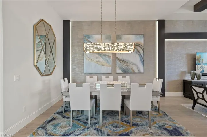 Dining room with wood-type flooring