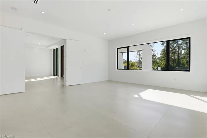 Unfurnished room featuring recessed lighting