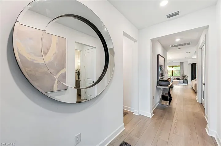 Hall featuring light hardwood / wood-style floors