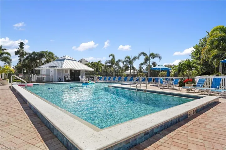 Community pool featuring a gazebo and a patio area