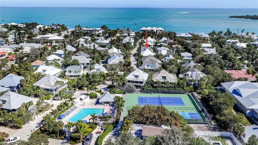 Aerial view of residential area with a large body of water