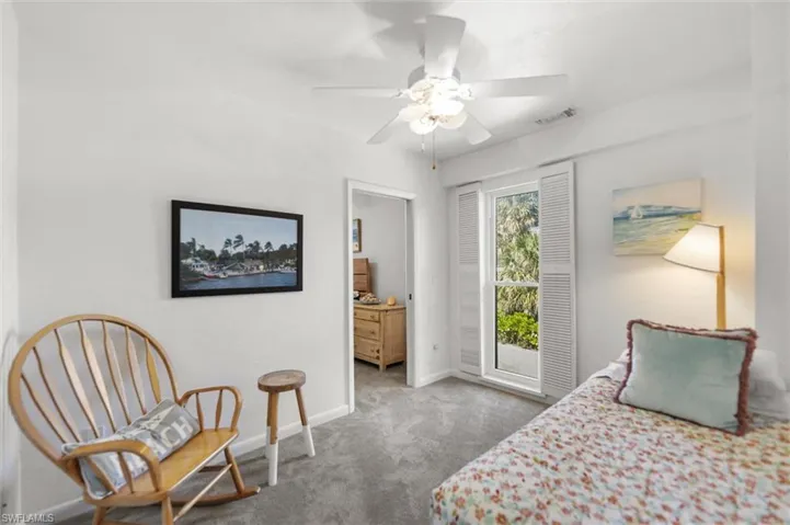 Bedroom featuring carpet flooring and a ceiling fan
