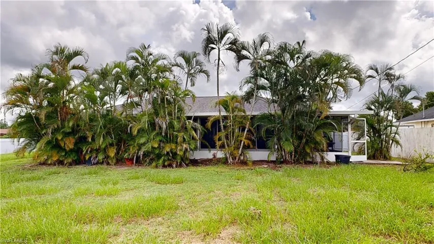 View of yard and back of home