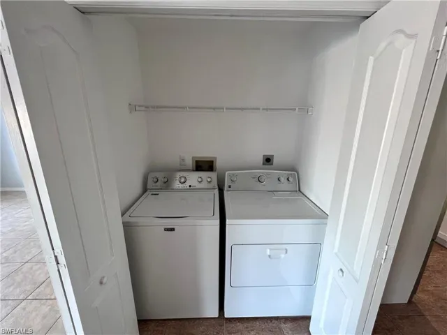 Laundry closet with washer and dryer
