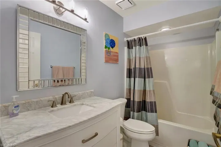 Bathroom with shower / bath combination