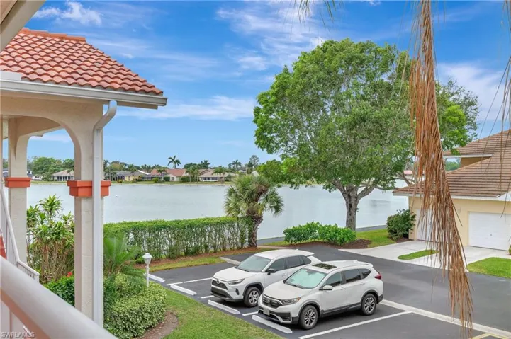 Assigned Carport and open parking available. Walking trail around the lake