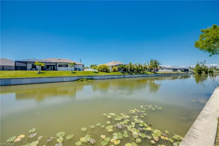 Water view with nearby suburban area