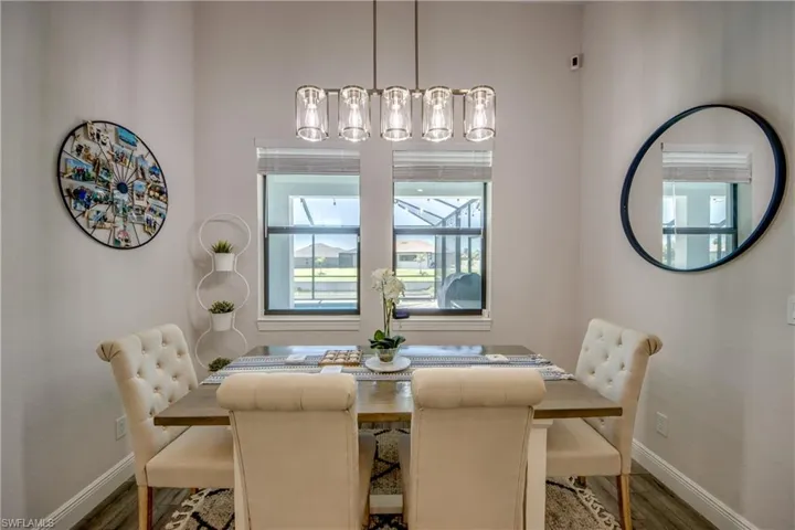 Dining room featuring baseboards and wood finished floors