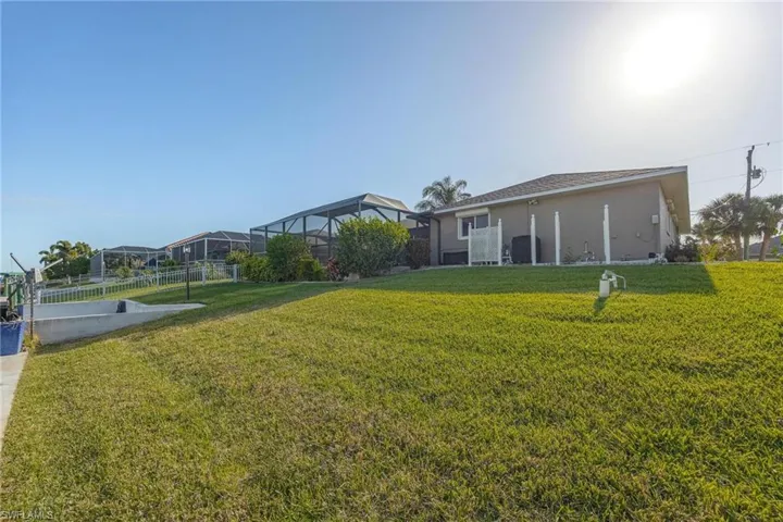 View of yard with a lanai
