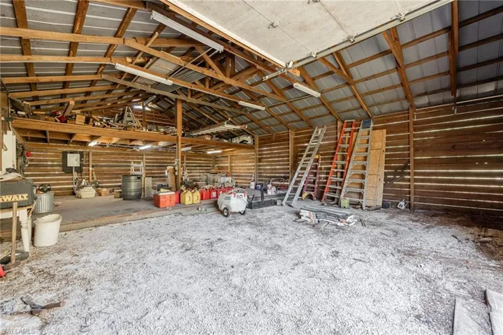 Misc room featuring lofted ceiling