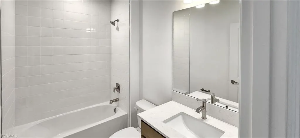 Unfurnished room featuring carpet floors and baseboards