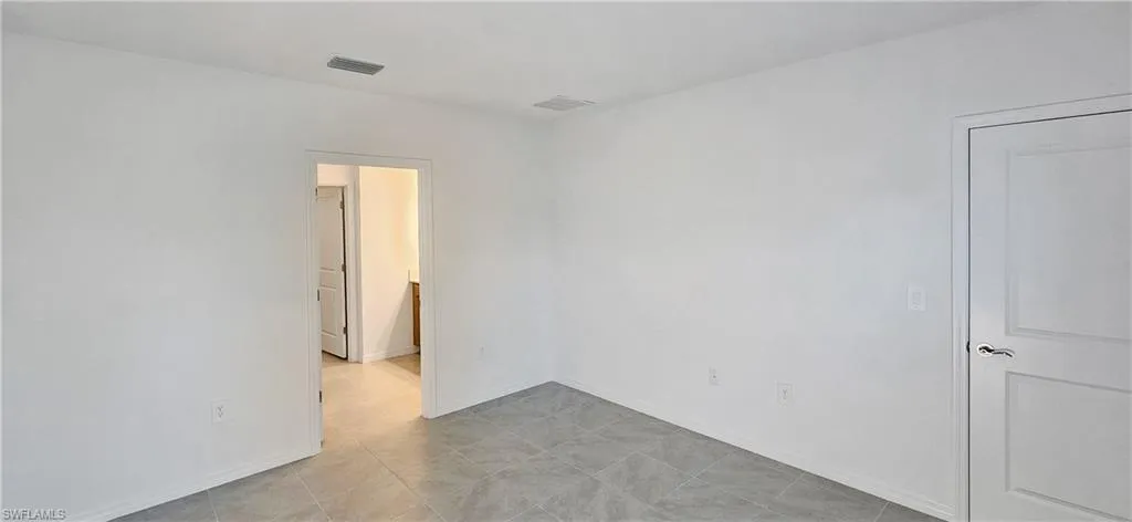Empty room with baseboards