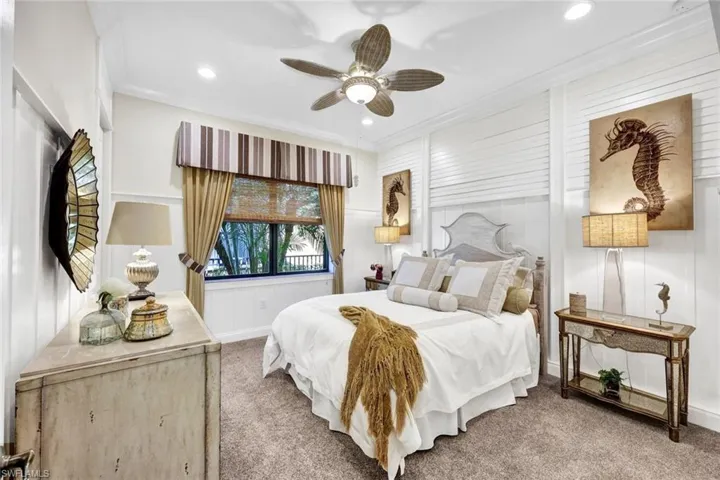 Bedroom 3 featuring designer furnishings, new carpet, custom trim, bedding and window treatments