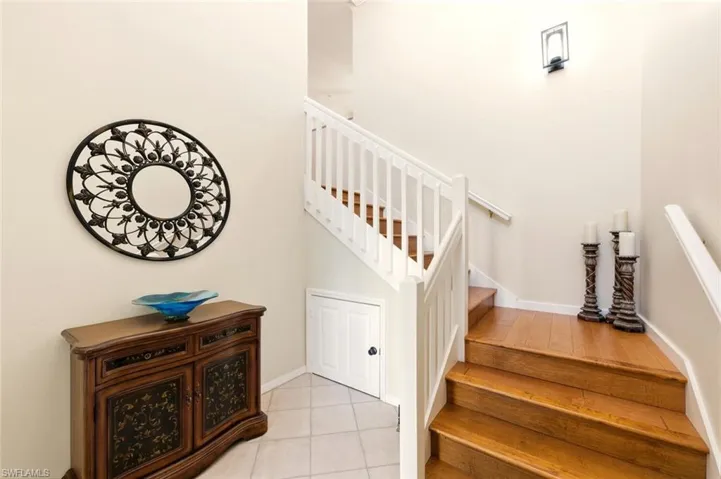 Few stairs versus many upstairs units.