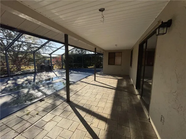 View of patio with a covered screened in lanai