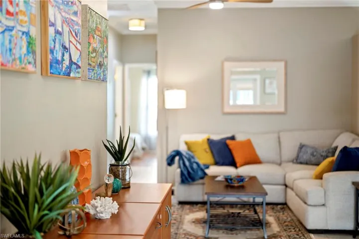 Living area featuring a ceiling fan