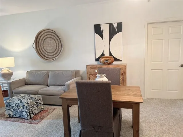 View of carpeted dining space