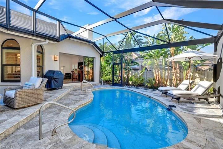 Notice the travertine tiles.