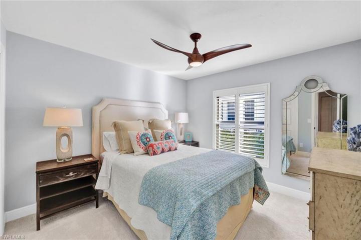 Guest bedroom is privately tucked away from the main living area.