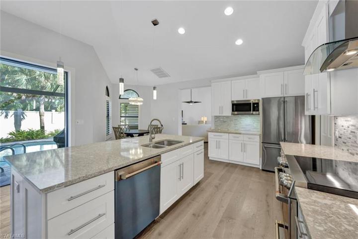 Enjoy views of your private pool while preparing your favorite meal.