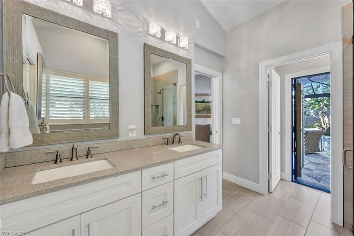 Private toilet room offers access to the pool.