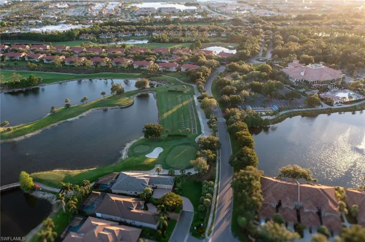 View of property location featuring nearby suburban area and a nearby body of water