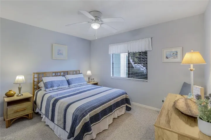 Bedroom with carpet floors and ceiling fan