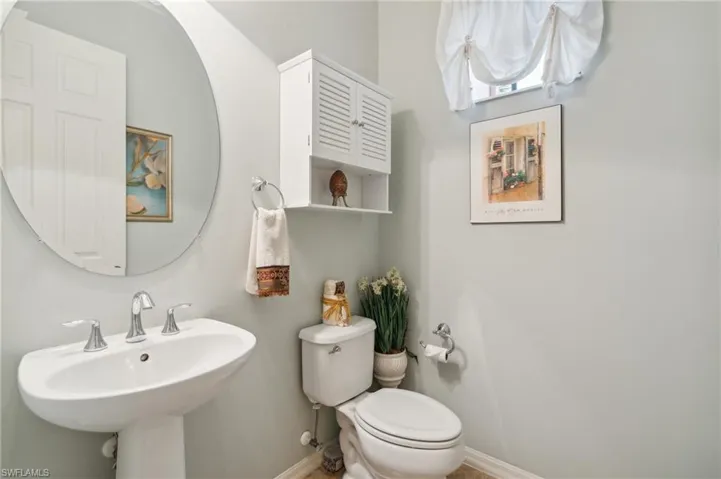 Bathroom with toilet and sink