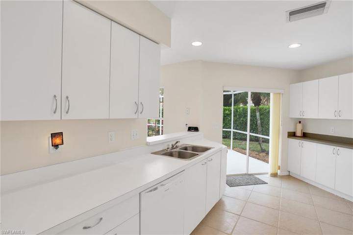 Kitchen and slider to screened large lanai