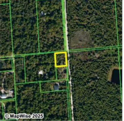 Aerial map of property and surrounding area featuring property boundaries highlighted