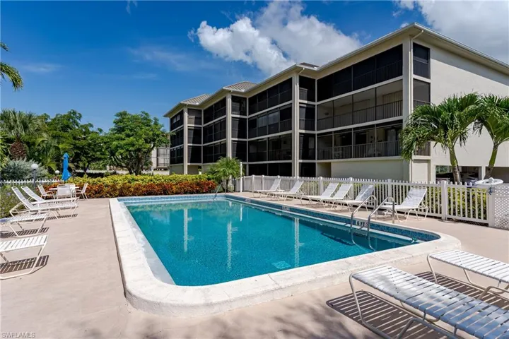 Community pool featuring a patio area