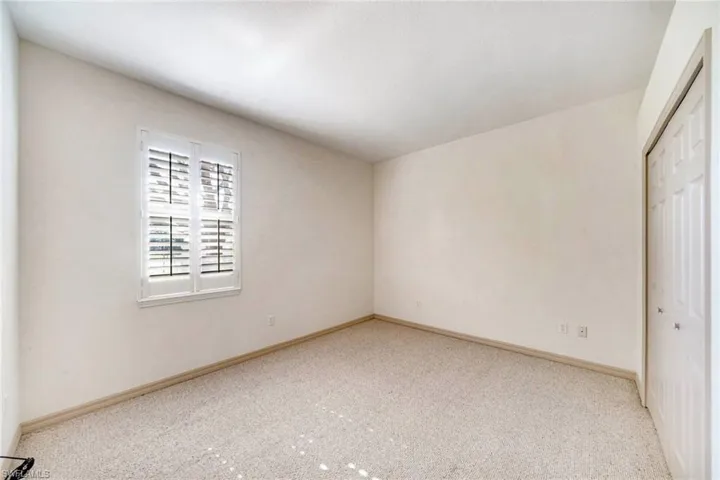 Unfurnished bedroom featuring a closet