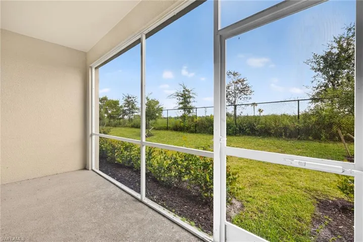Unfurnished sunroom with healthy amount of natural light