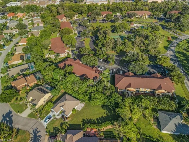 Aerial overview of property's location with nearby suburban area
