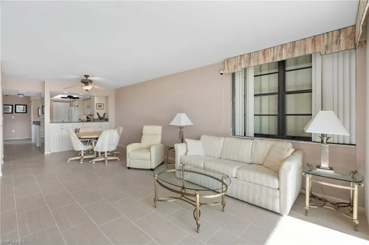 Living room featuring ceiling fan