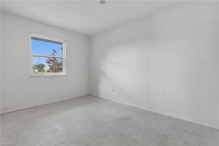 Empty room with baseboards