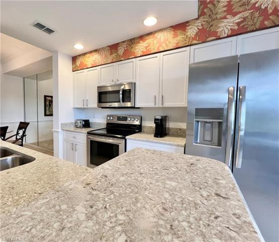 White Shaker Cabinets and SS appliances