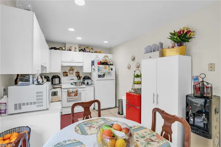 Dining room with light tile floors