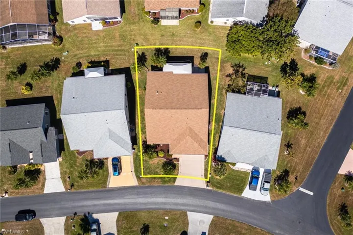 Aerial view of home with a newer roof