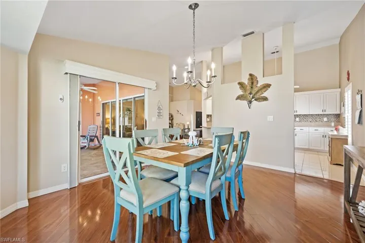 Dining space with slider to the screened lanai