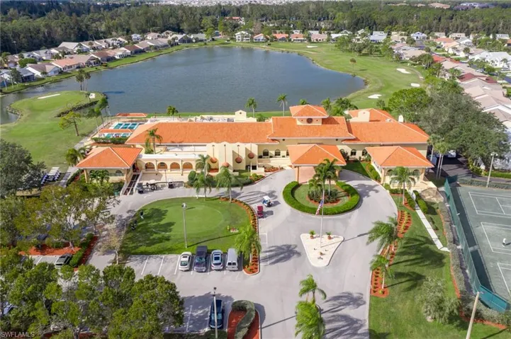Aerial view of community center, lake & golf course