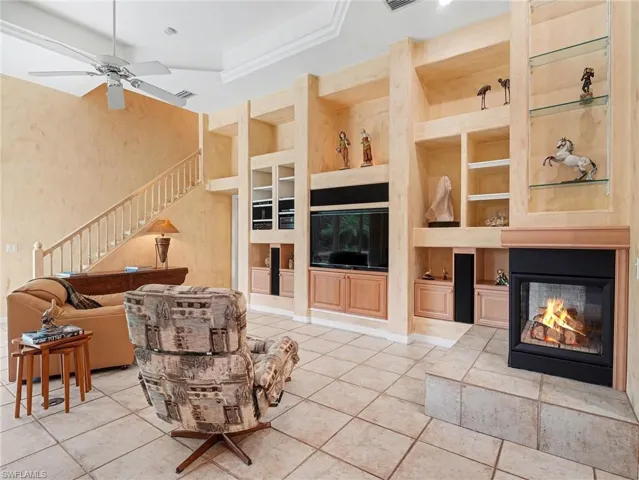Family room. The built-in sound/entertainment system and fireplace makes this a wonderful room for relaxing.