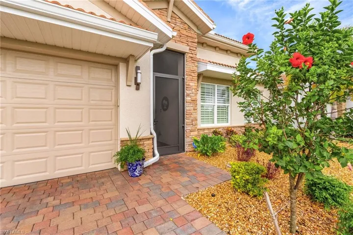 Entrance to property with a garage