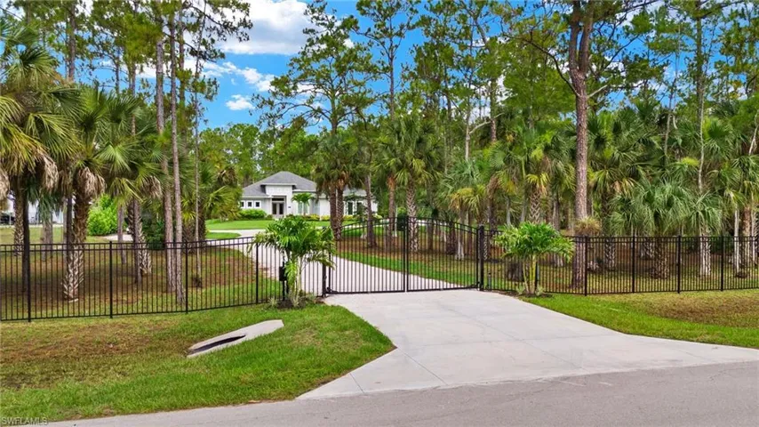 View of home's community featuring a yard