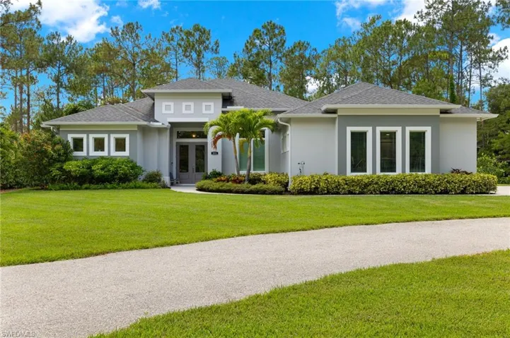 Prairie-style home with a front lawn