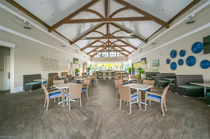 Dining room with beamed vaulted,  ceiling