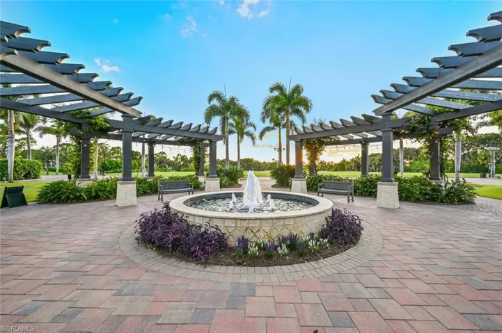 Surrounding community featuring a pergola and a patio area