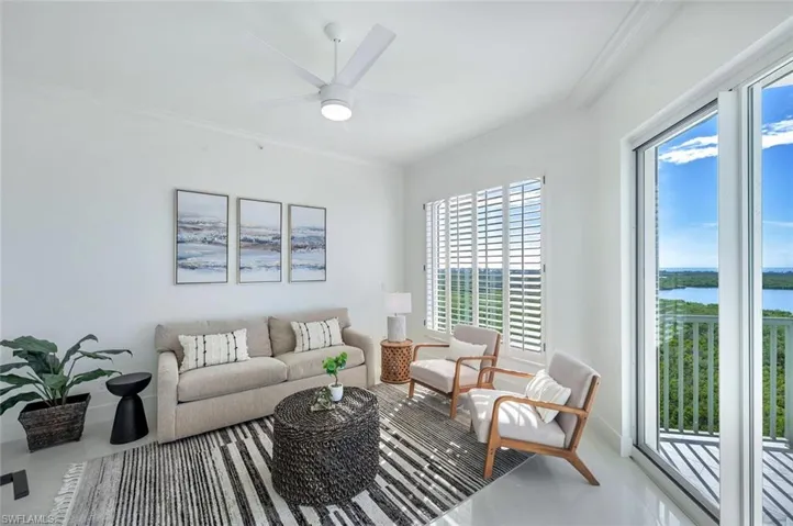 featuring a water view and walkout to the open air balcony